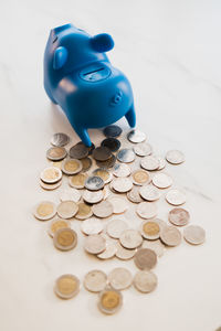High angle view of coins