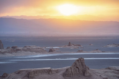 Scenic view of sea against sky during sunset