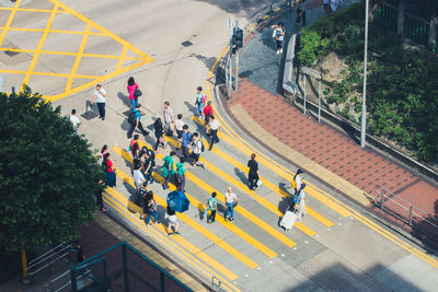 High angle view of people on road in city