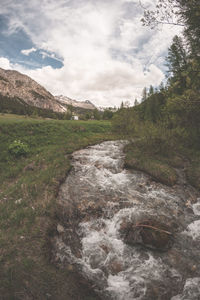 Scenic view of river against sky