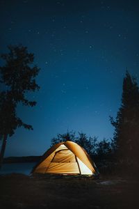 Tent against sky at night