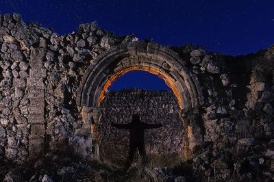 View of cross against sky at night