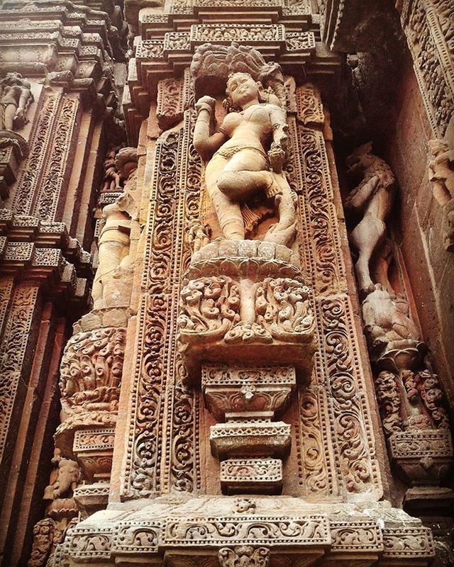 art and craft, statue, art, human representation, sculpture, creativity, religion, carving - craft product, spirituality, place of worship, low angle view, famous place, architecture, ornate, history, travel destinations, built structure, tourism, travel