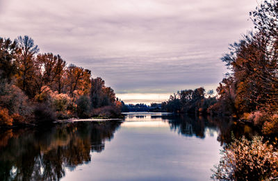 Scenic view of lake against sky during autumn
