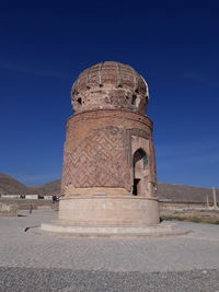 Low angle view of historical building against blue sky