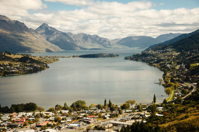 Scenic view of mountains against cloudy sky