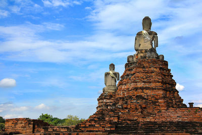 Low angle view of statue against sky