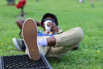 Woman lying on field