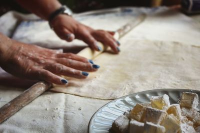 Close-up of person preparing food