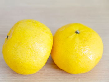 Close-up of oranges on table