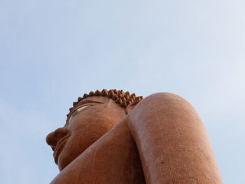 Low angle view of sculpture against clear sky