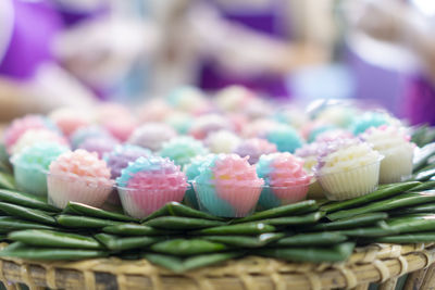 Close-up of multi colored candies in basket