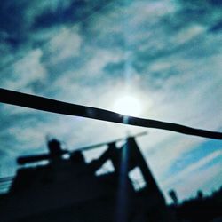 Low angle view of cloudy sky at sunset