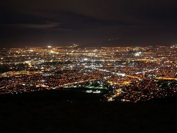 Illuminated cityscape at night