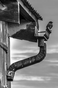 Low angle view of sculpture against sky