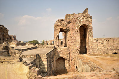 Golconda fort area ruined structure walls in india background stock photograph