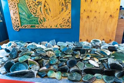 Stack of stones against blue wall