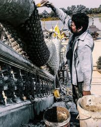 High angle view of man working at temple