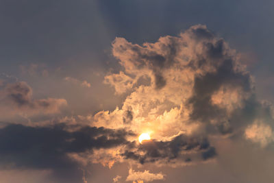 Low angle view of clouds in sky during sunset