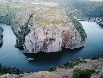 High angle view of rocks in sea