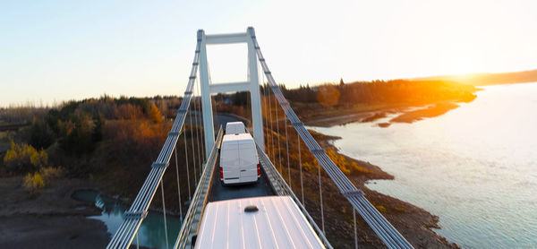 Panoramic view of bridge against sky during sunset