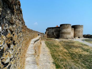 Ruins of historical building against clear sky