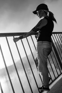 Woman standing against sky