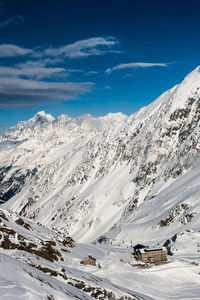 Scenic view of snow covered mountains