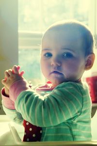 Close-up of cute baby at home