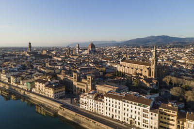 Aerial view of florence along the arno river and the old town from above, tuscany, italy,