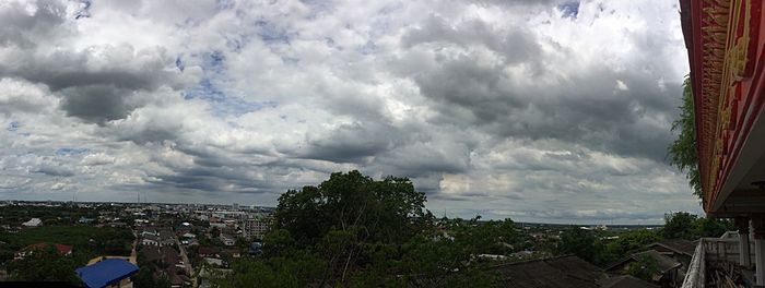 Panoramic view of storm clouds over town