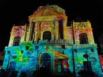 Low angle view of illuminated built structure