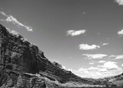 Low angle view of rock formation against sky