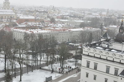 High angle view of buildings in city during winter