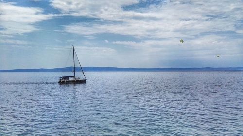 Boats moored in sea