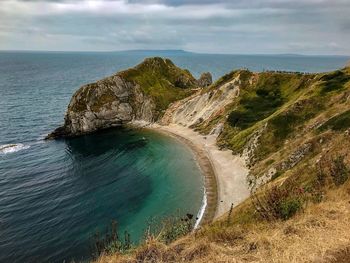 High angle view of sea shore against sky