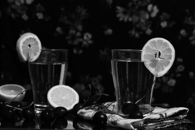 Close-up of wine glasses on table