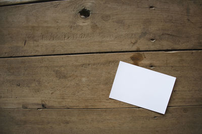 High angle view of paper on table