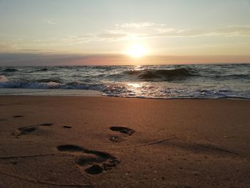 Scenic view of sea against sky during sunset