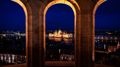 Illuminated buildings in city at night in budapest