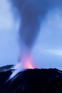 Scenic view of volcanic mountain against sky