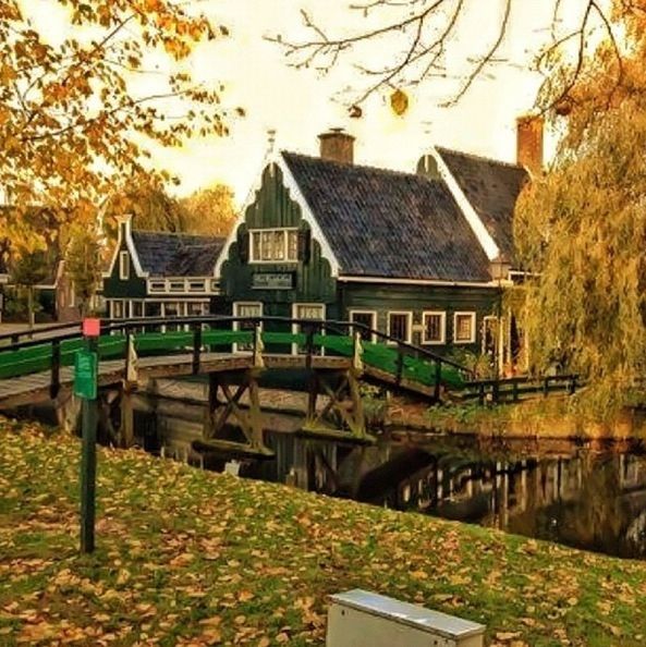 built structure, architecture, building exterior, water, tree, house, railing, residential structure, canal, residential building, reflection, nature, sky, plant, autumn, day, river, bridge - man made structure, outdoors, footbridge