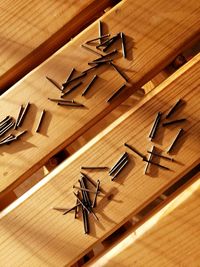 High angle view of nails on table