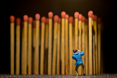 Tiny photographer and huge matchsticks