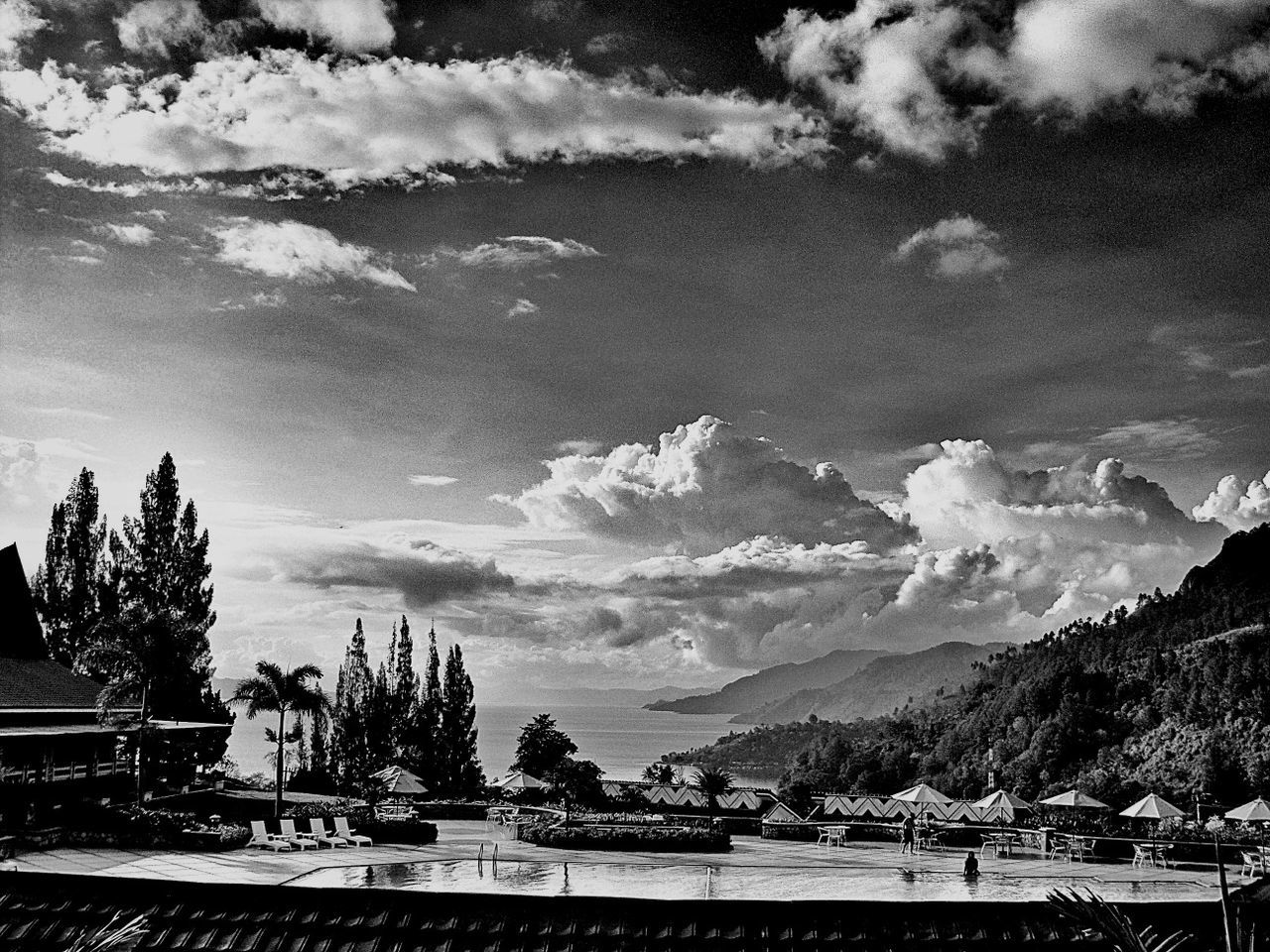 mountain, sky, mountain range, cloud - sky, scenics, beauty in nature, landscape, tranquil scene, tree, cloudy, nature, tranquility, cloud, weather, day, non-urban scene, idyllic, outdoors, snowcapped mountain, travel destinations