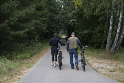 People riding bicycles