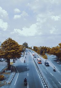 Cars on road against sky