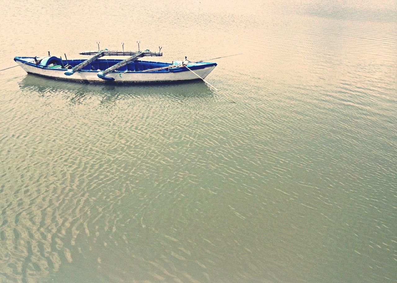 nautical vessel, transportation, boat, mode of transport, water, moored, sand, sea, beach, high angle view, waterfront, shore, day, outdoors, travel, no people, copy space, rippled, tranquility, nature