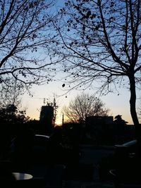 Cars on road at sunset