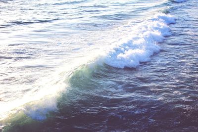 Waves splashing on rocks